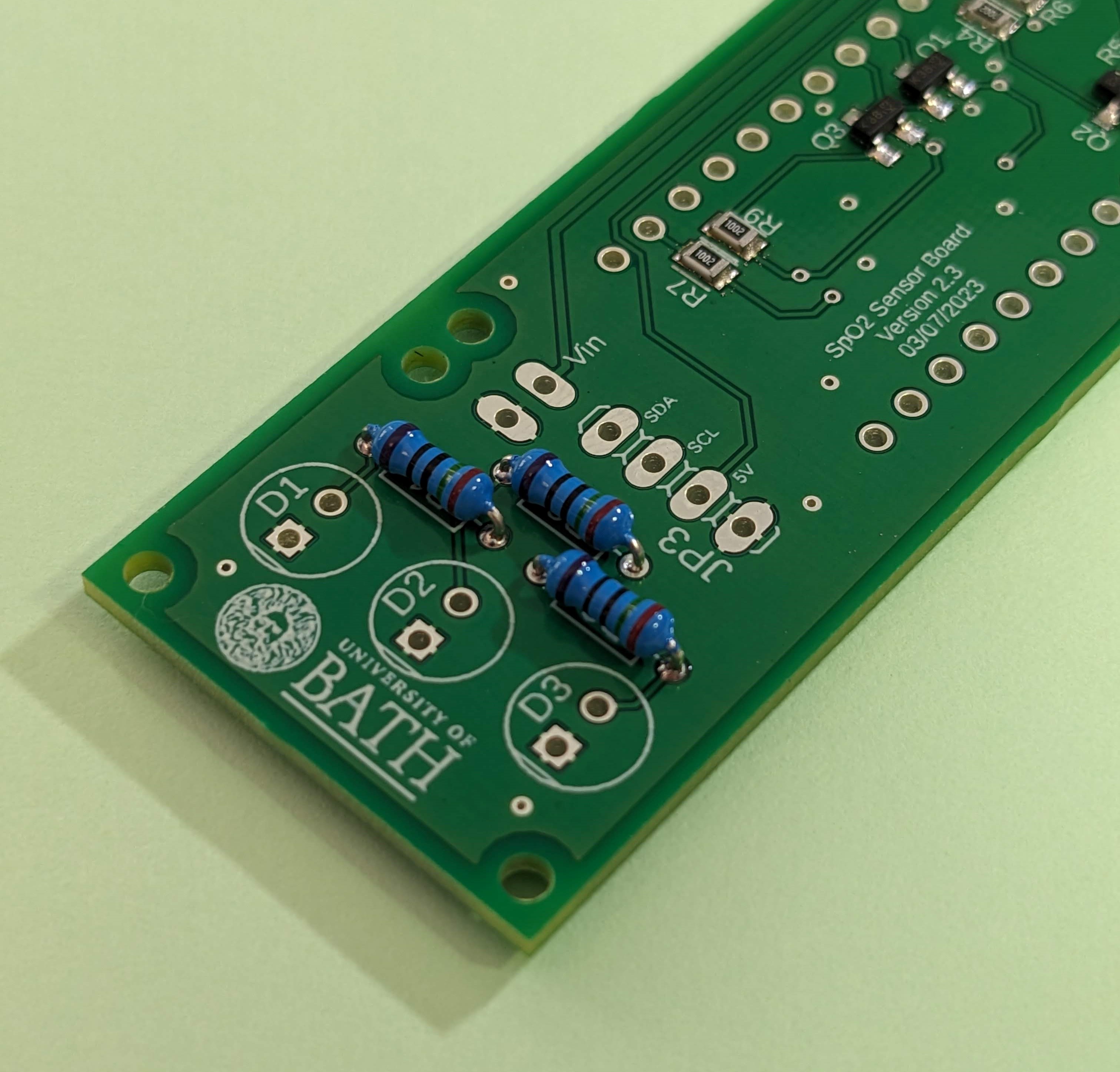 The PCB with the through-hole resistors added.