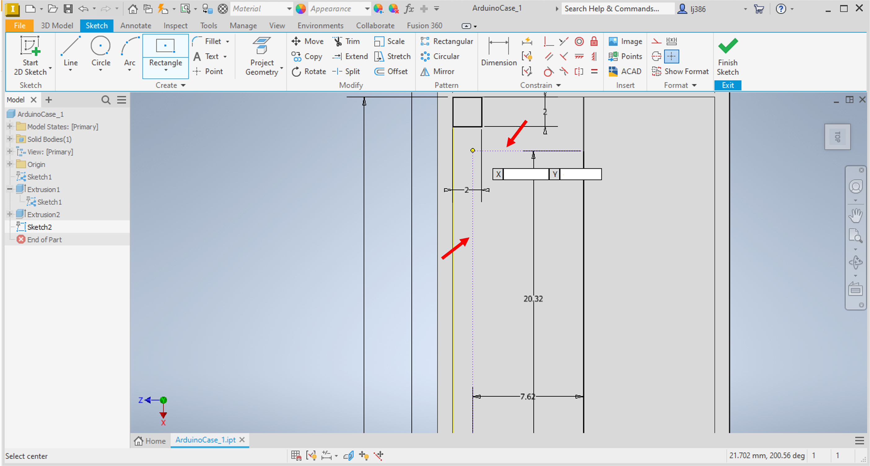 Drawing lines to identify the location of the mounting holes.