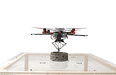 Aerial Additive Building Manufacturing